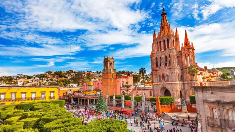 Aerial view of the Parroquia de San Miguel Arcángel and Jardín Principal, showcasing the vibrant heart of San Miguel de Allende, Mexico