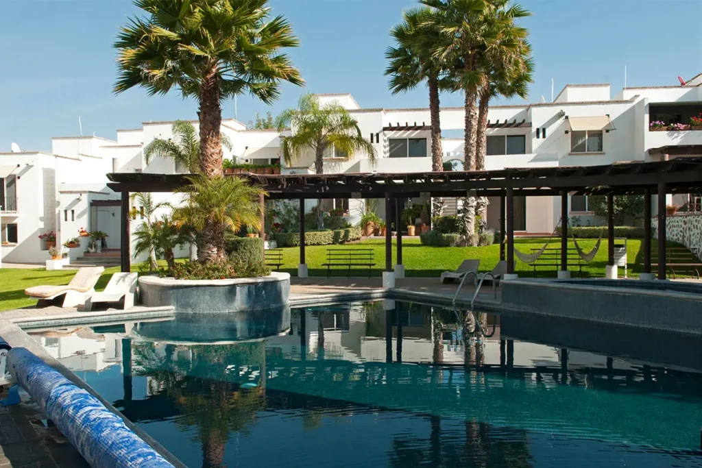 Community pool and modern townhomes in Paseo Real San Miguel de Allende